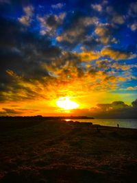 Scenic view of sea against sky during sunset