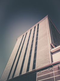 Low angle view of modern building against clear sky