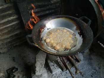 High angle view of meat in cooking pan