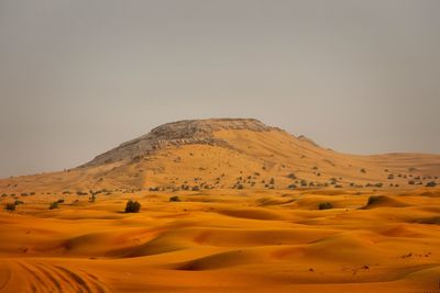 Scenic view of desert against sky