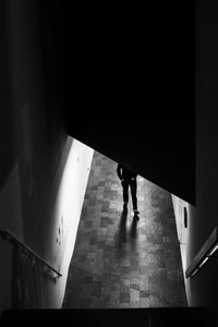 Low section of woman standing on floor