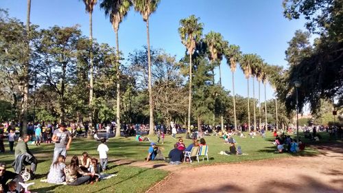 People relaxing in park