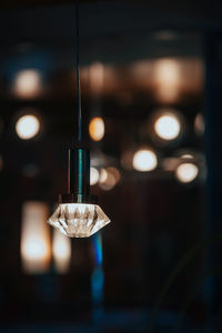 Close-up of illuminated light bulb