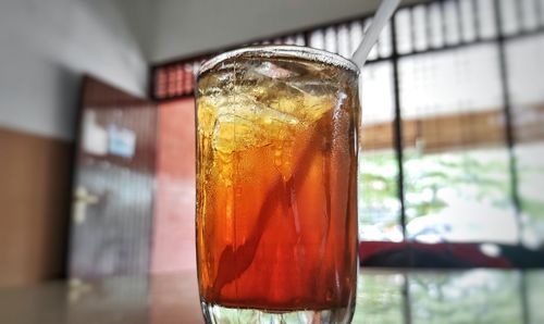 Close-up of beer in glass on table