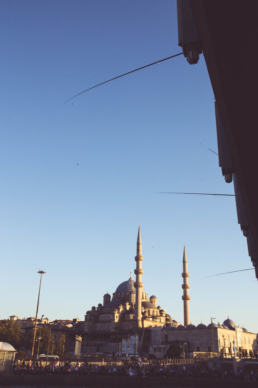 Low angle view of buildings against clear sky