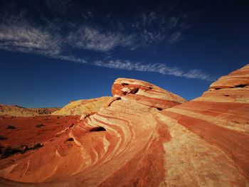 Rock formations in desert against sky