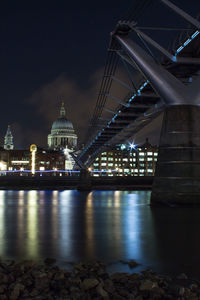 Bridge over river at night