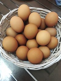 High angle view of eggs in basket