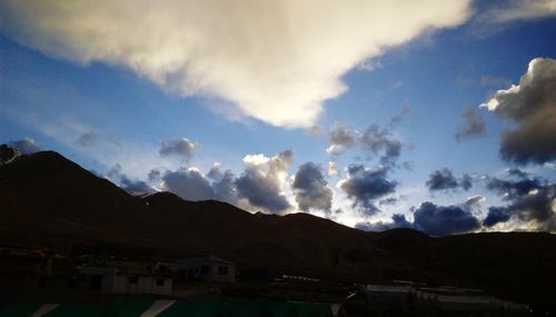 Scenic view of mountains against sky during sunset