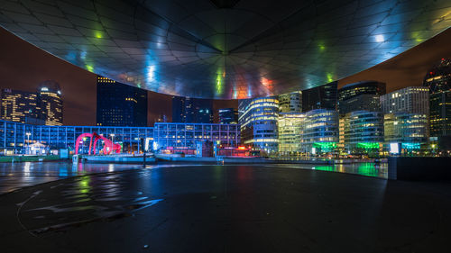 Illuminated modern building in city at night