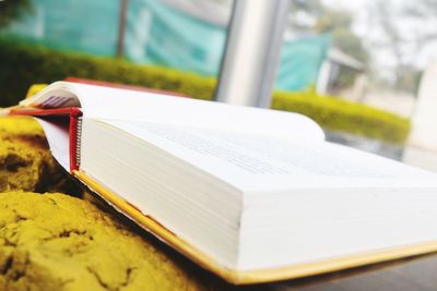 Close-up of open book on table