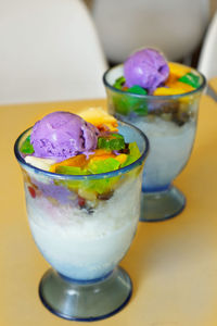 Close-up of ice cream served on table