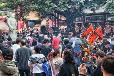 Group of people in town square