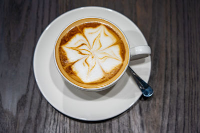 Cup of coffee on table