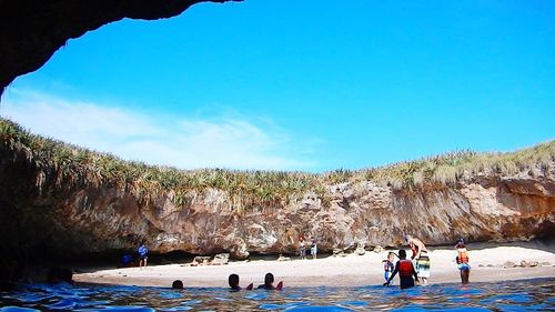 Tourists enjoying at beach