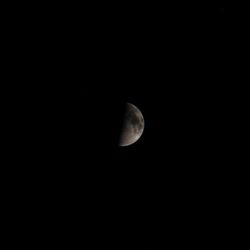 Scenic view of moon against clear sky at night