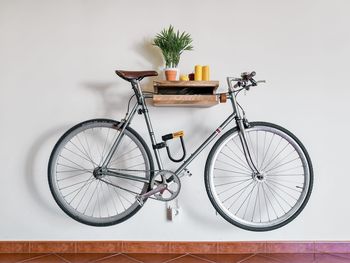 High angle view of bicycle against white background