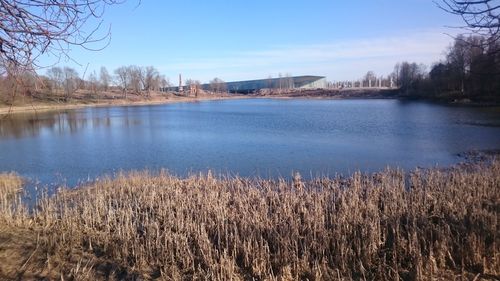 Calm lake along countryside landscape