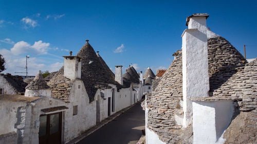 Low angle view of old ruins against sky