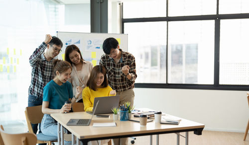 Business colleagues working at office
