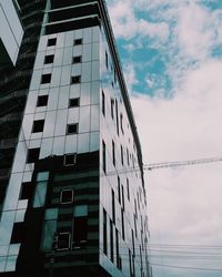 Low angle view of modern building against sky