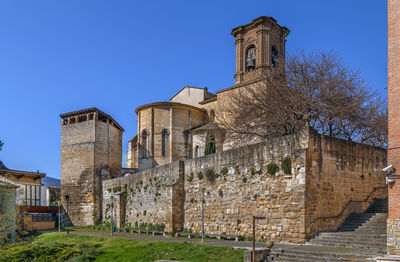 Low angle view of old building against clear sky