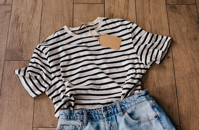 Midsection of woman standing on floor