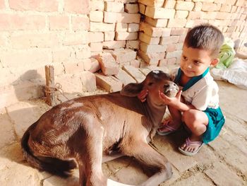 Full length of girl playing calf