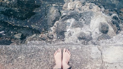 Woman feet in water
