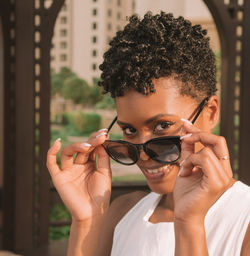 Portrait of woman wearing sunglasses