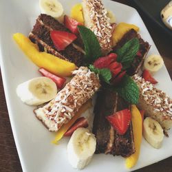 Close-up of fruits served in plate