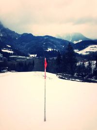 Scenic view of snow covered mountains