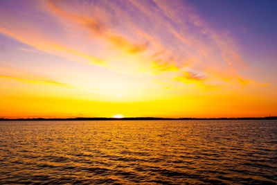 Bright beautiful sunrise or sunset at sea.