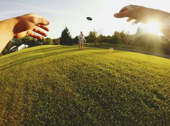 Woman standing on grass