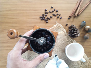High angle view of man preparing food on table