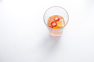 High angle view of fruits in glass on table