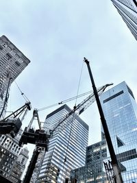 Low angle view of skyscrapers against sky