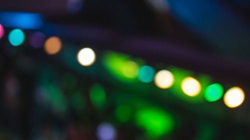 Defocused image of illuminated lights at night