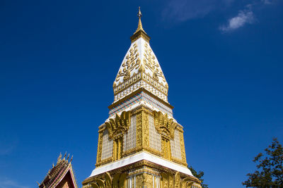 Low angle view of building against blue sky