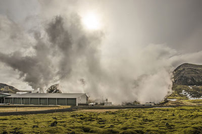 Clouds of steam obscuring the sun near the hellisheiði geothermal power plant