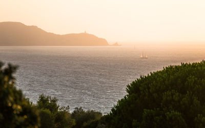 Scenic view of sea against sky during sunset