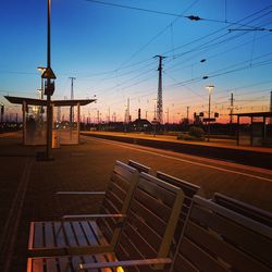 View of empty street against sky at sunset