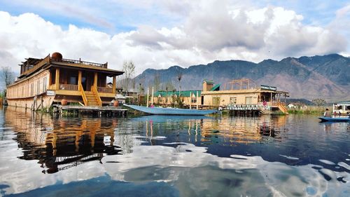 Boats moored at harbor
