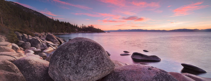 Scenic view of lake against sky during sunset