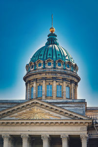 Low angle view of building against blue sky