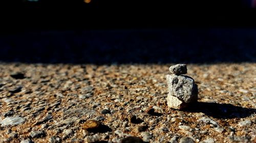 Close-up of stones on ground