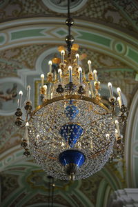 Low angle view of illuminated chandelier