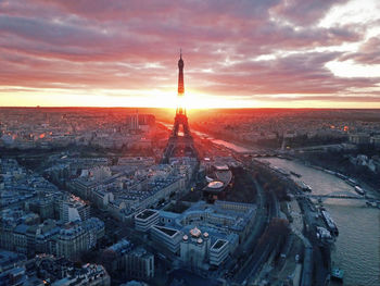 High angle view of city against sky during sunset