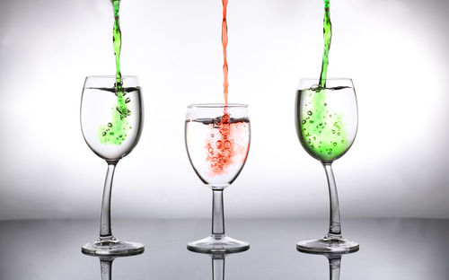 Close-up of wine in glass on table