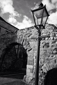 Low angle view of street light against sky